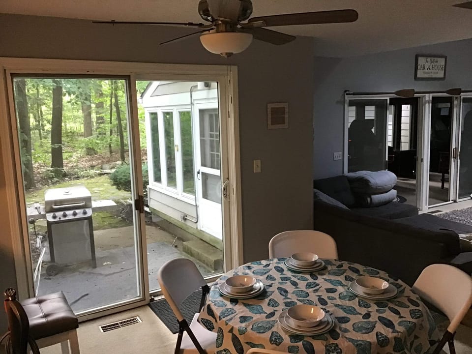 Game room with view into pool room