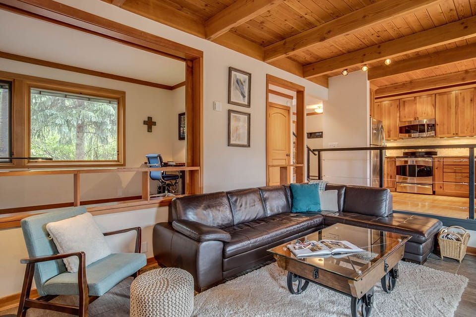 Living room view with office privacy doors open