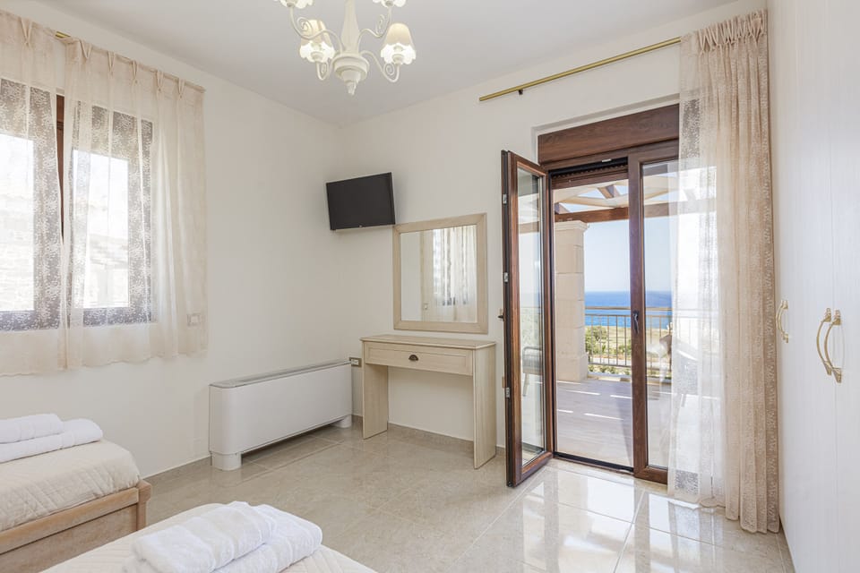 The twin bedroom also has access to the balcony.