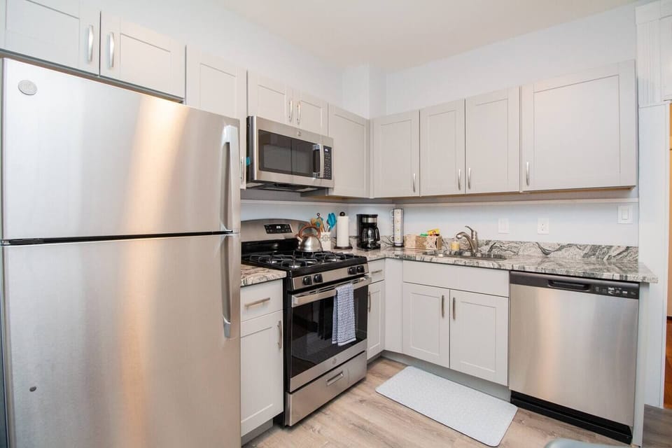 Kitchen, Lots of cabinet storage for all utensils the unit comes equipped with
