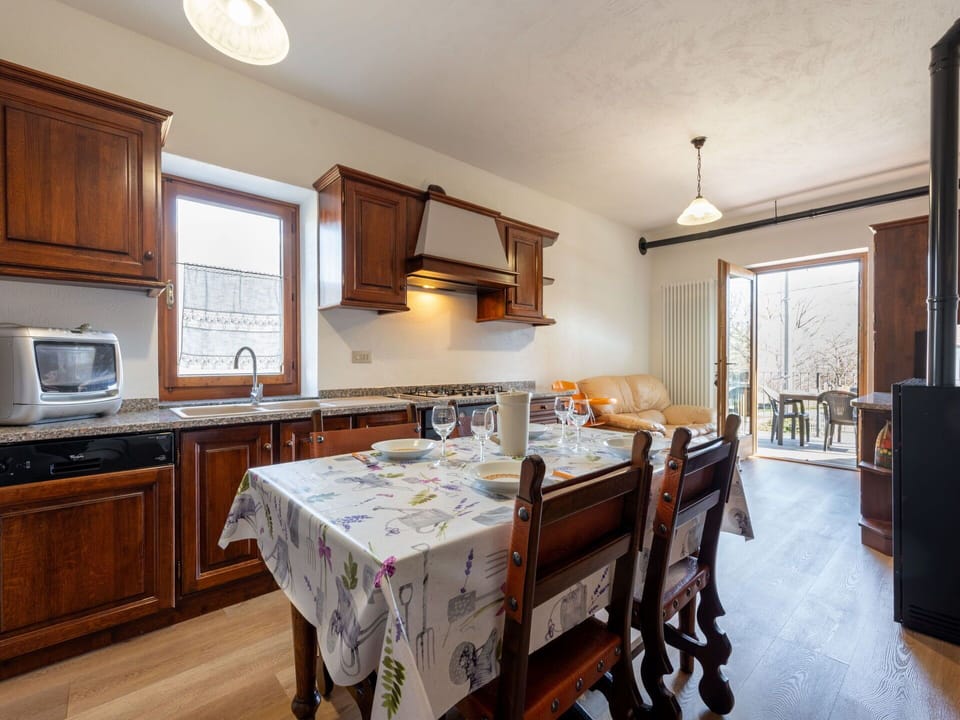Cabinetry, Property, Furniture, Window, Table, Countertop, Wood, Interior Design, Lighting, Kitchen