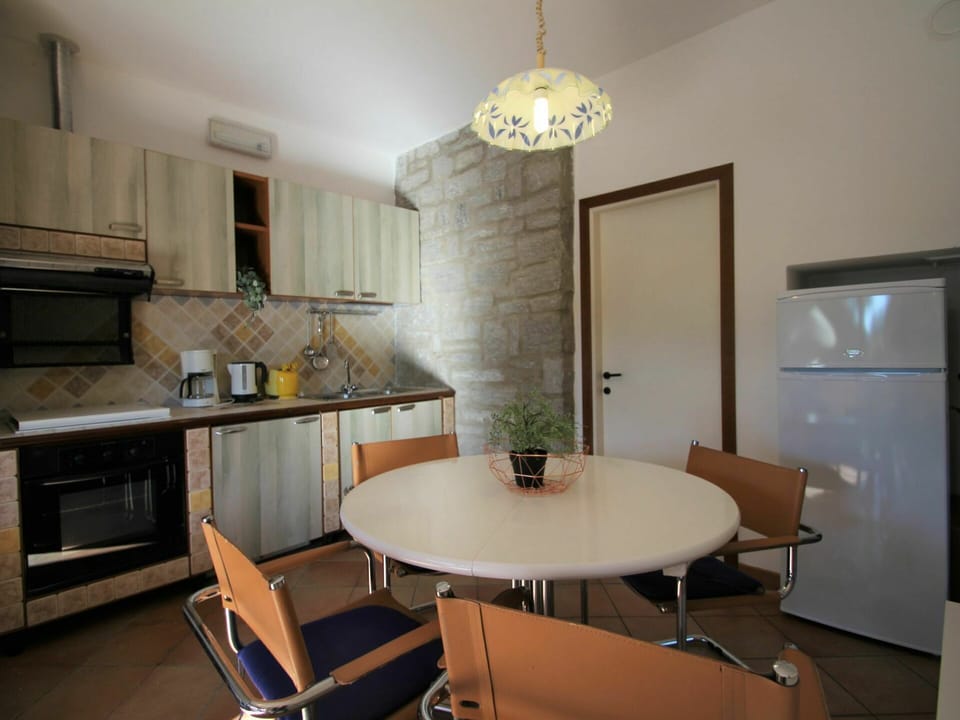 Furniture, Property, Table, Cabinetry, Countertop, Sink, Chair, Interior Design, Lighting, Wood