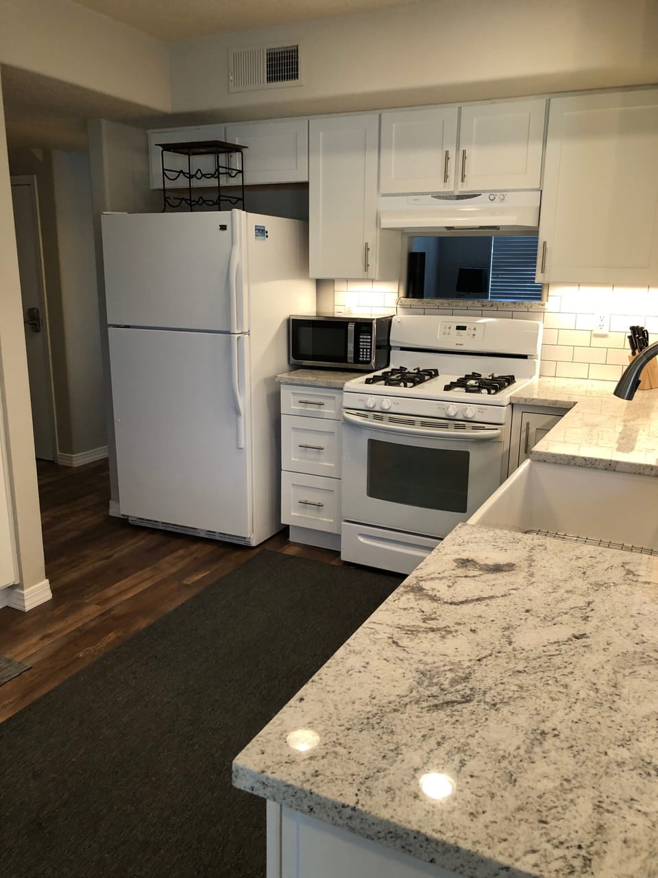 Kitchen with granite counter tops and farm sink