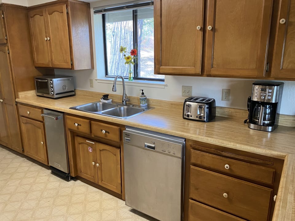 Stainless steel appliances in the fully equipped family kitchen