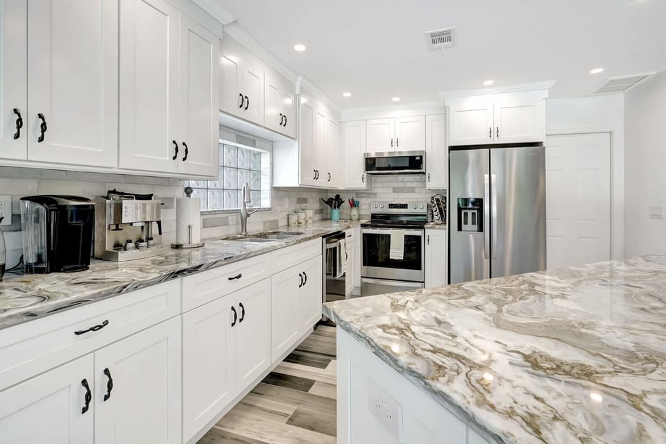 The kitchen is located in the center of the home and it was completely refurbished in 2023