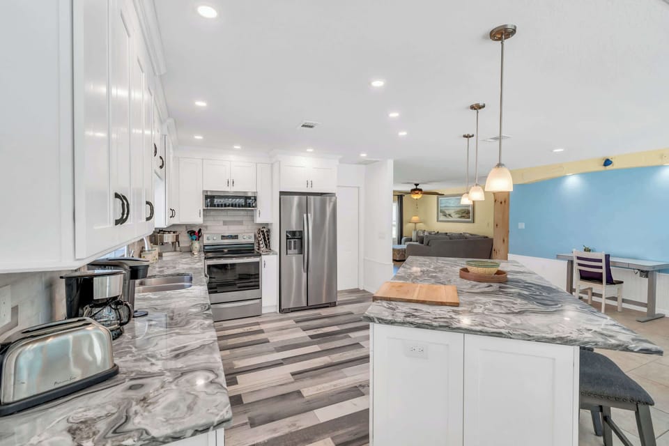 Our modern kitchen is fully equipped with a regular and Keurig coffee maker and an espresso machine.  