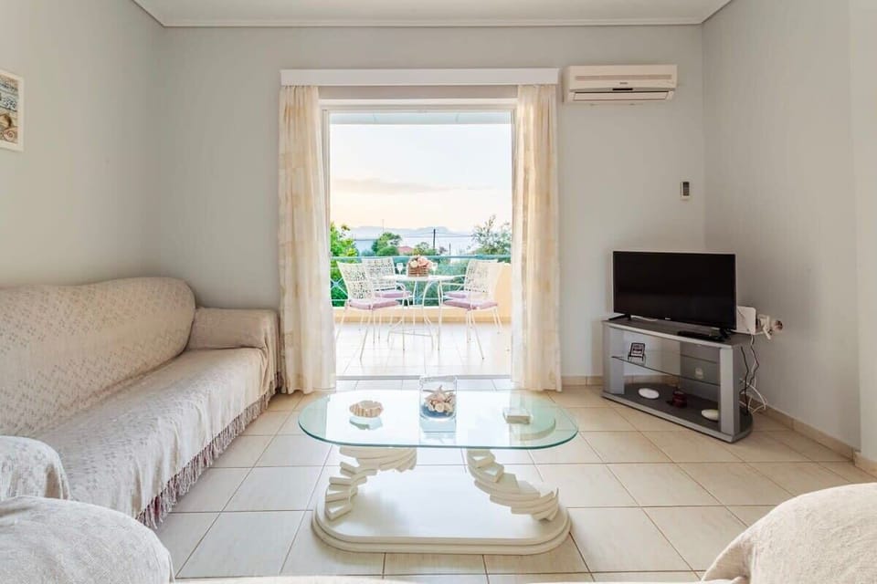 Bright, open living room ideal for relaxing or reading.