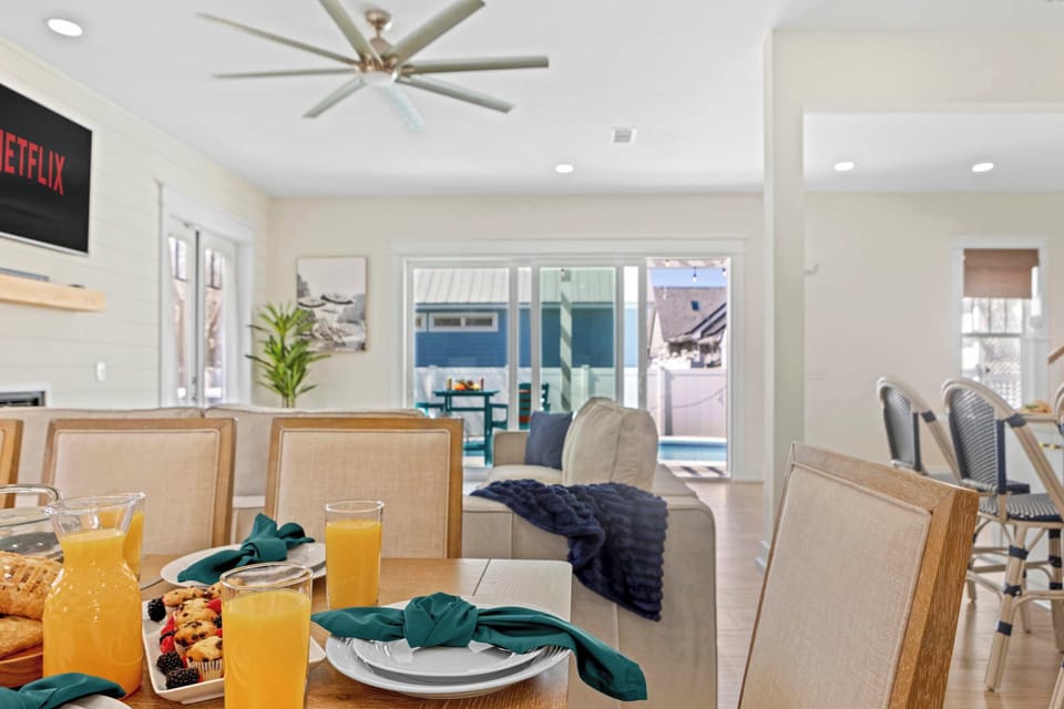 “Bright dining area with open views to the living room and private pool.”
