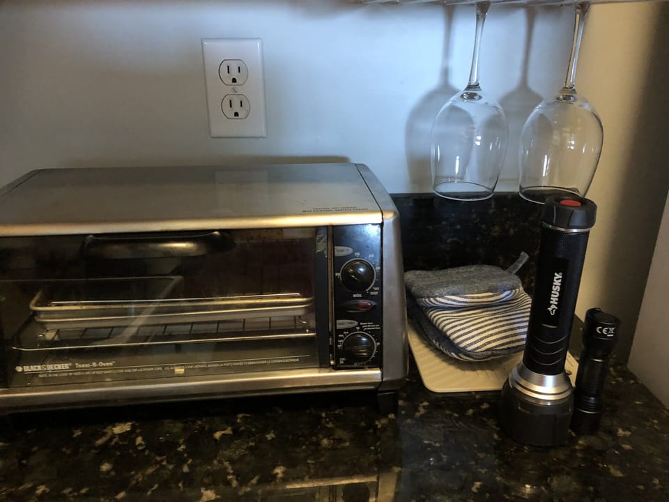 Toaster, toaster oven, inside grill 
Variety of plastic, glassware, & cookware.