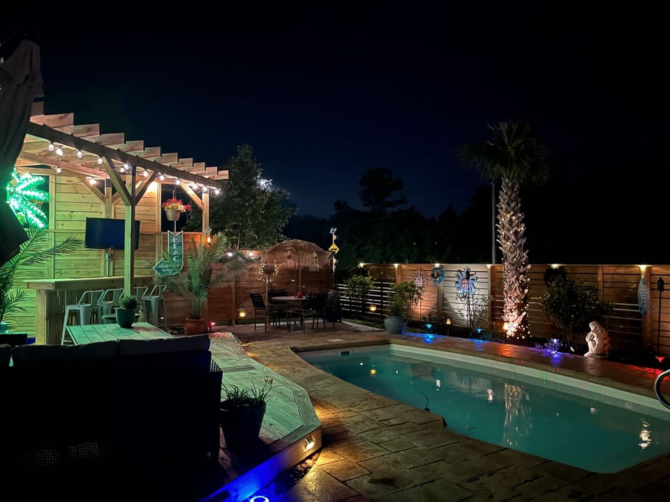 An evening of magical fun by pool and outdoor bar.