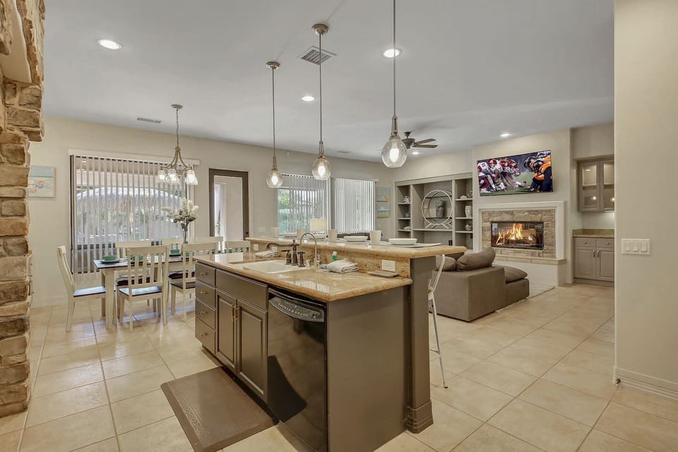 You'll be able to watch TV and socialize with guests in the living room while you cook.