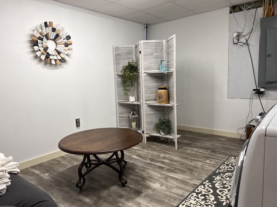 Newly added toilet in laundry room for basement use. 
