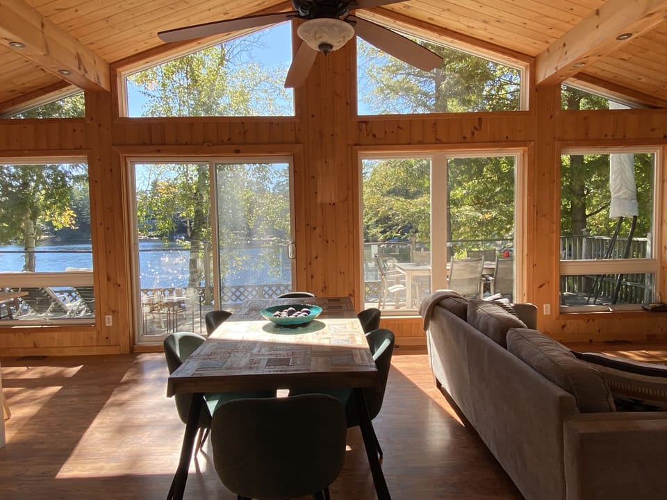 Views from the kitchen/dining area with walkout to large lakeside deck.