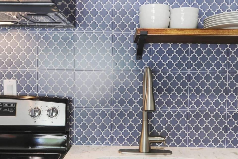  The faucet and sink create a symphony of design and functionality