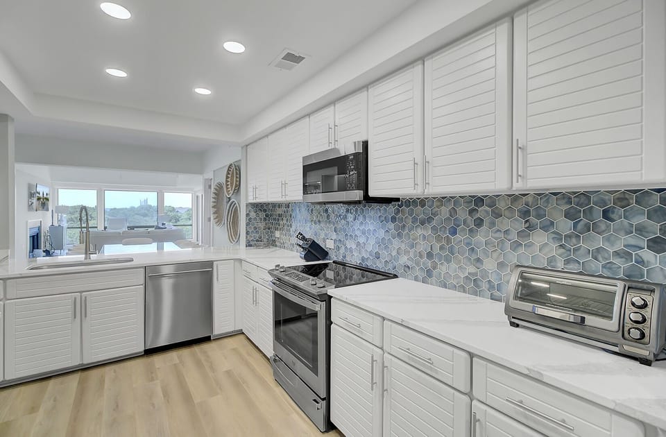 The kitchen features updated appliances.