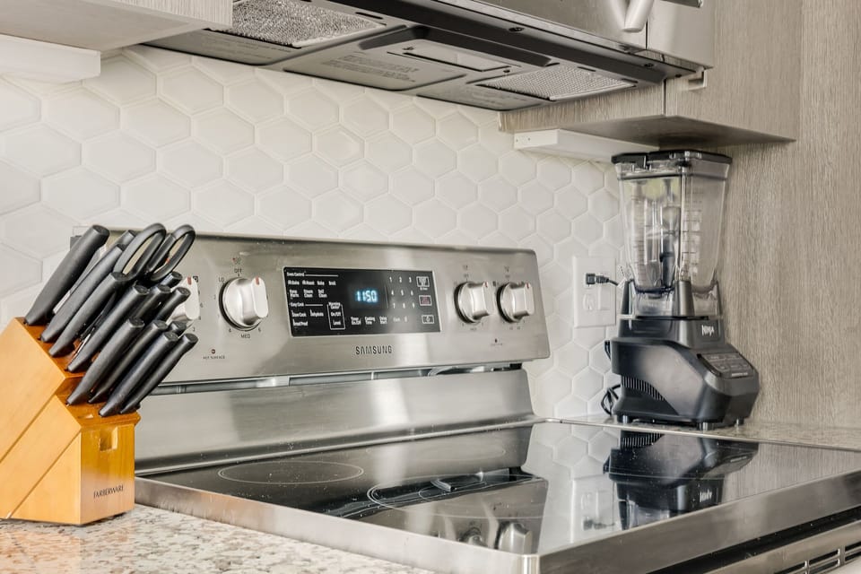 Full kitchen with stainless steel appliances