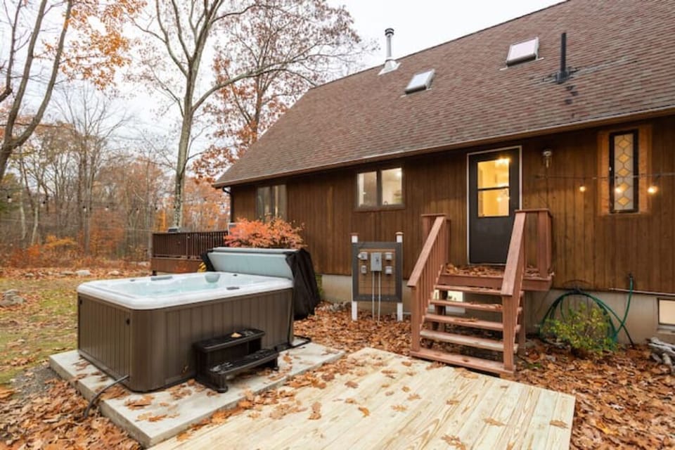 Step right outside to our 6-person hot tub and relax among the trees and stars.