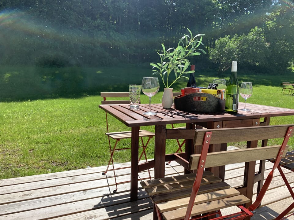 Outdoor patio or Backyard. Note this is a different house. But same tables!