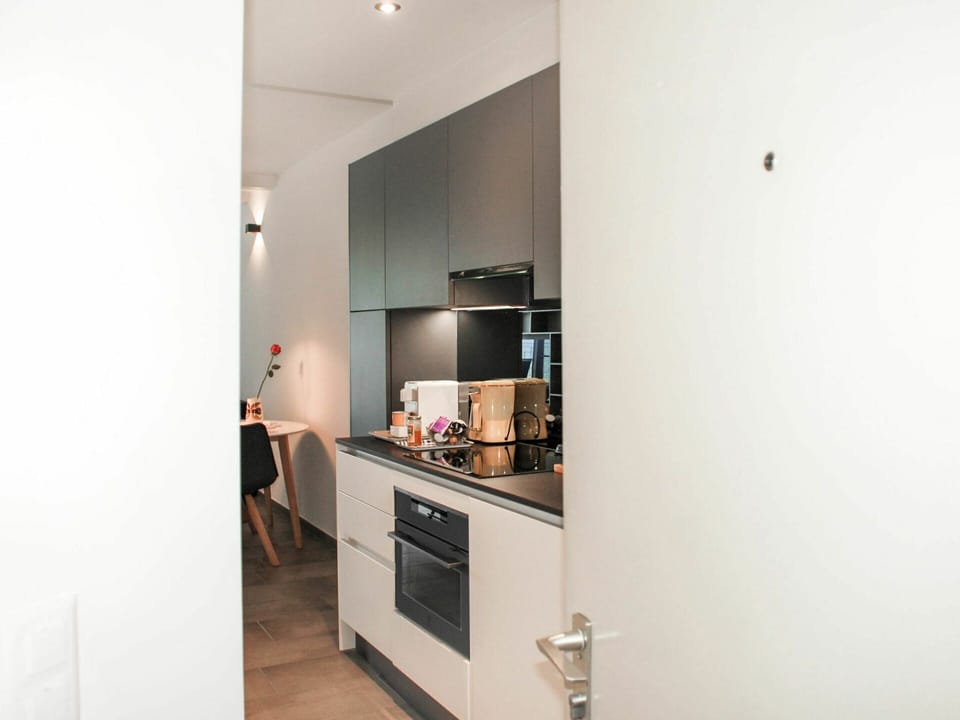 Furniture, Cabinetry, Building, Wood, Hall, Floor, Flooring, Chair, Countertop