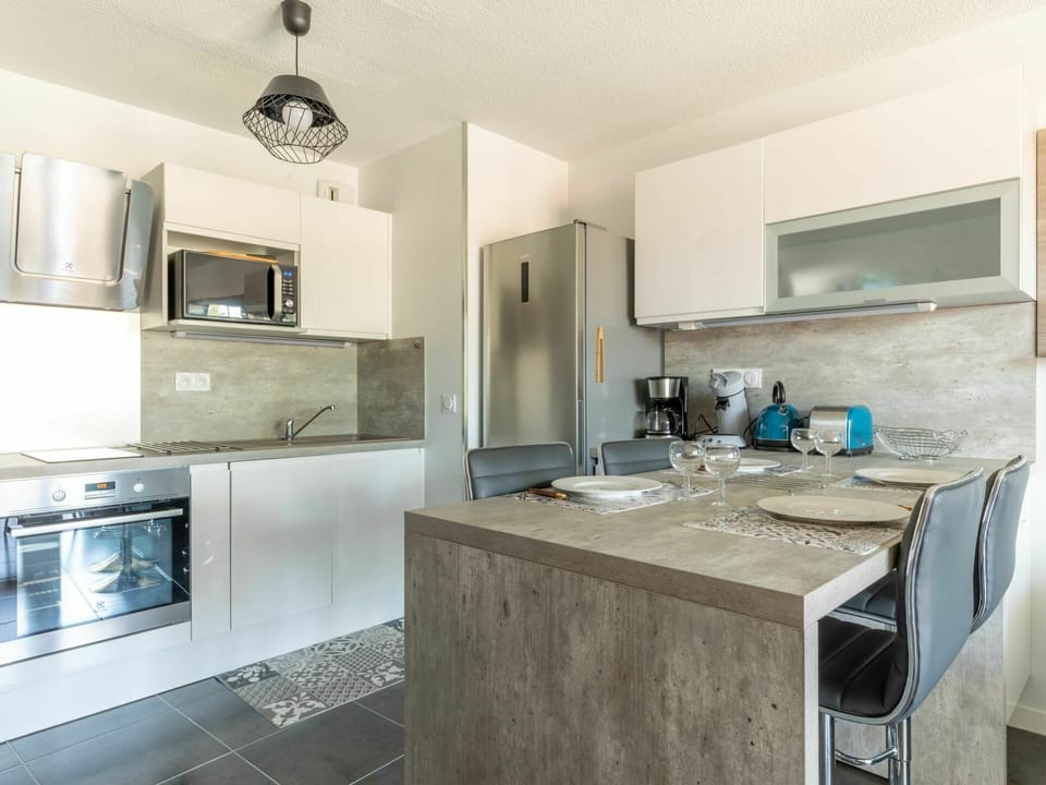 Cabinetry, Countertop, Kitchen Sink, Sink, Kitchen Appliance, Kitchen Stove, Kitchen, Tap, Wood, Home Appliance