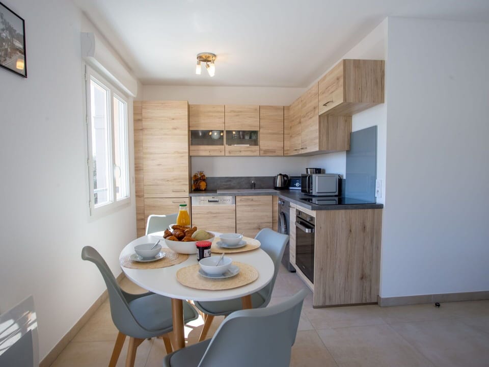 Cabinetry, Furniture, Countertop, Wood, Chair, Table, Lighting, Interior Design, Floor, Picture Frame