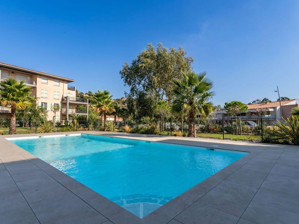 Water, Plant, Sky, Swimming Pool, Tree, Blue, Building, Condominium, Shade, Leisure