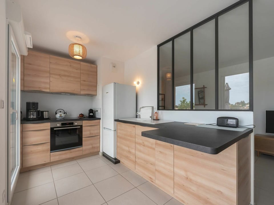 Cabinetry, Countertop, Property, Kitchen, Kitchen Stove, Wood, Home Appliance, Kitchen Appliance, Building, Lighting