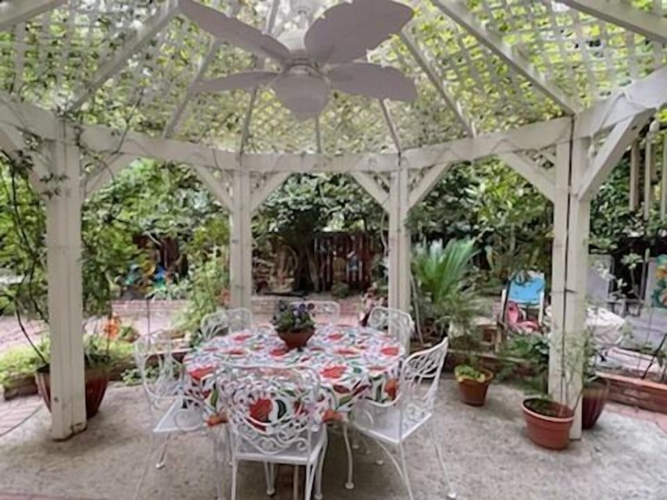 Gazebo for outside dining with fan and lighting.