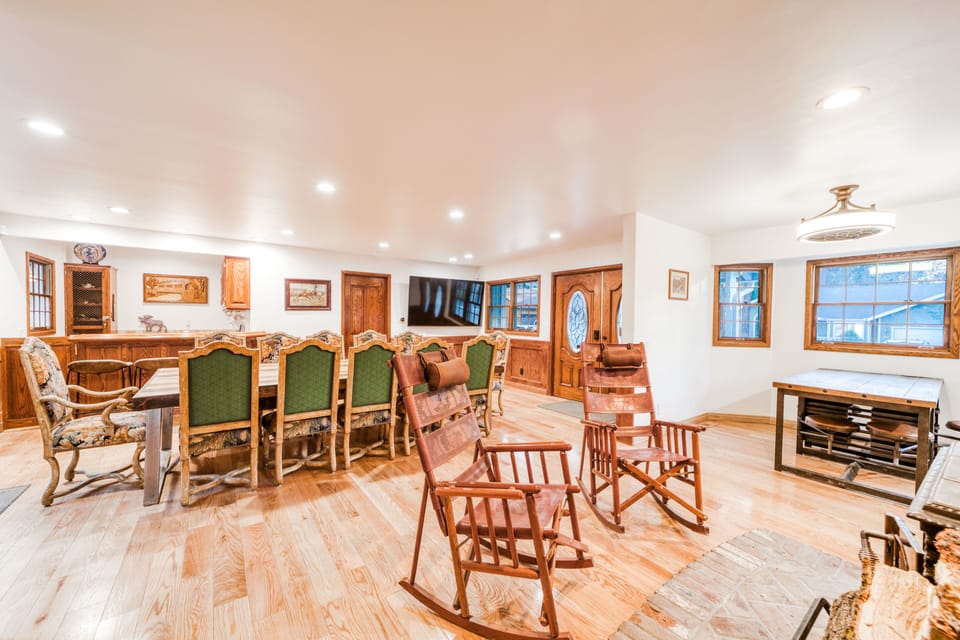 Stylish dining area with open access to living room, blending comfort and convenience for guests