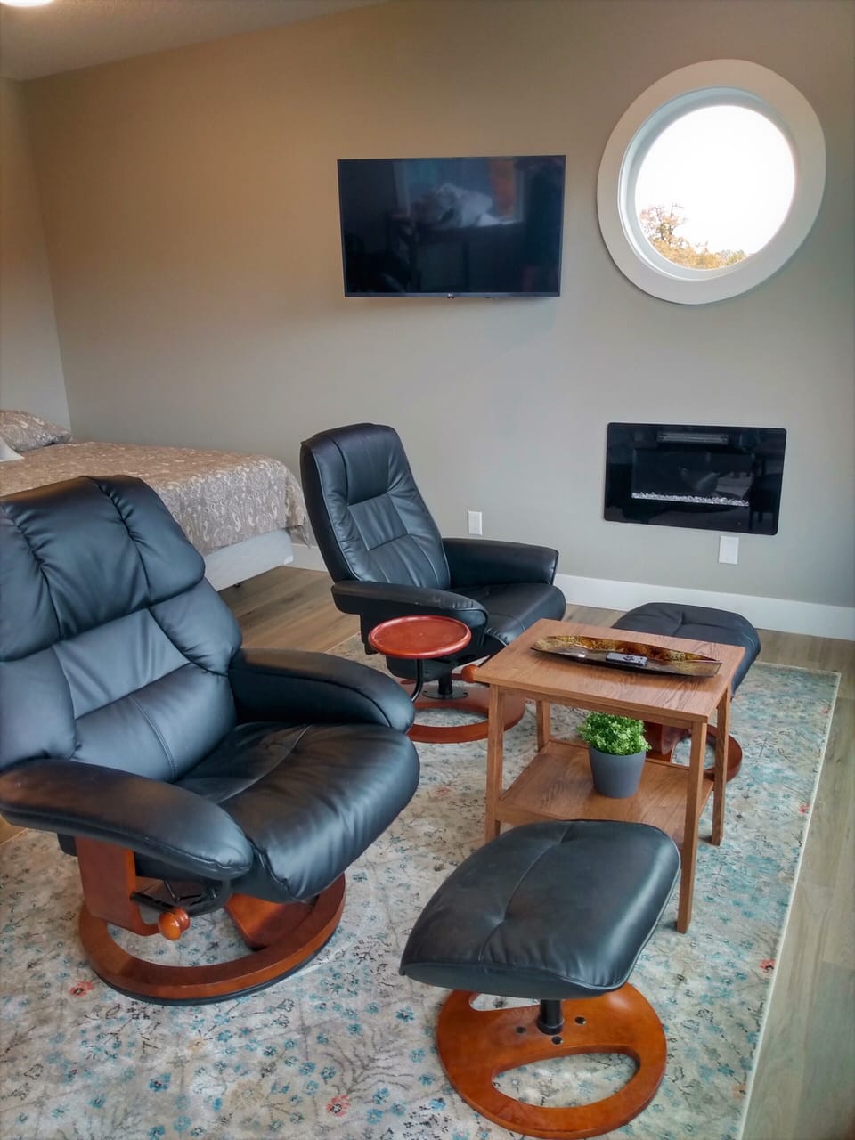 Adjustable television and electric fireplace, plus controllable heat pump/ AC.