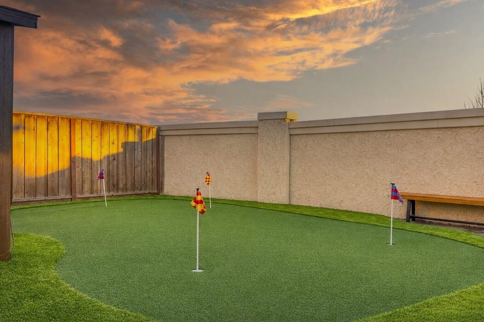 Your private backyard green—perfect for a morning practice or family fun