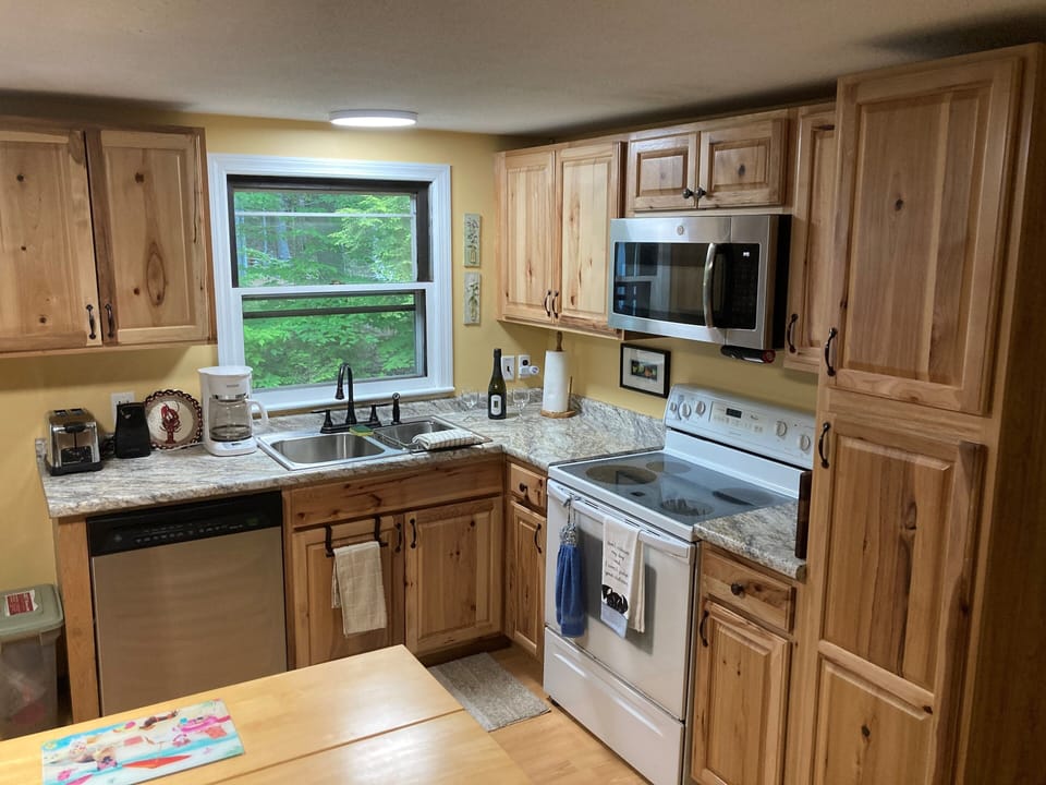 Updated kitchen includes all the basics!  New stove coming later 2021.