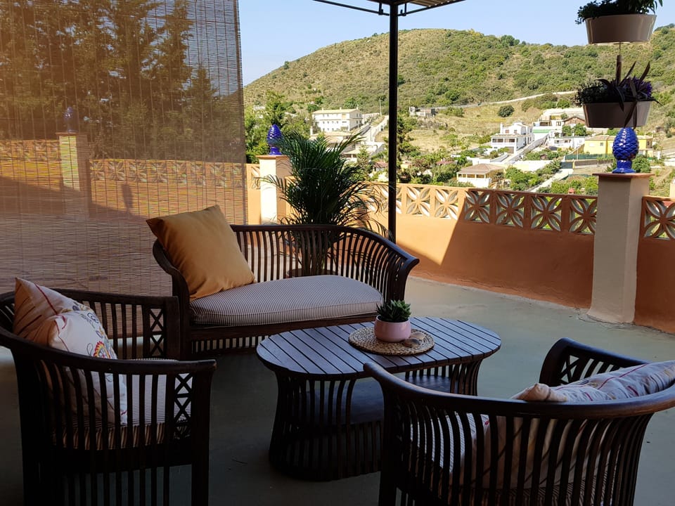 Private Terrace with two seating areas: coffee table for 4; dining table for 4