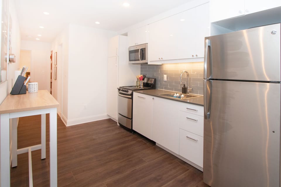Open kitchen with new cabinetry