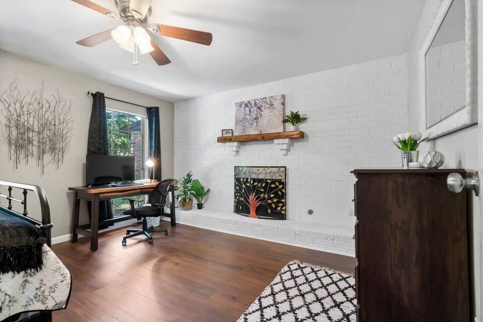 Desk and decorative fireplace