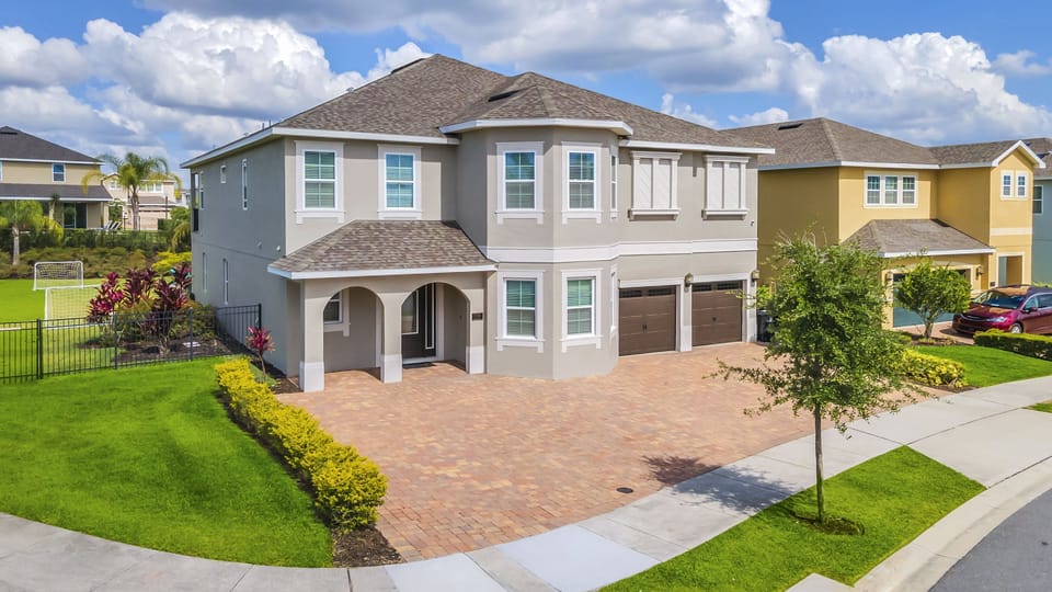 A slightly different angle gives a better sense of the home’s scale and curb appeal, reinforcing its premium feel.