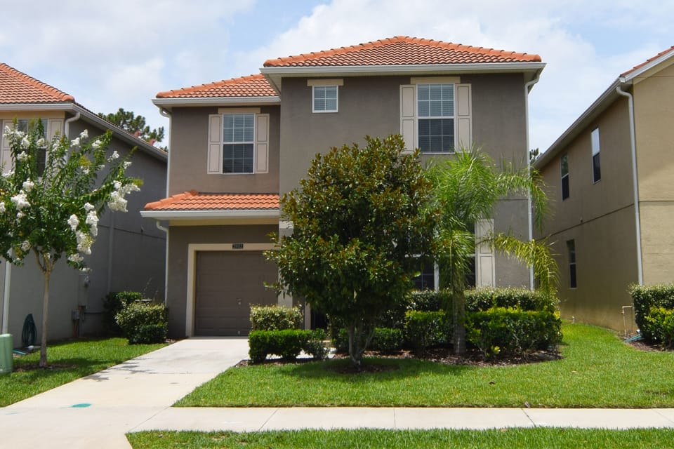 Front of this beautiful pool home