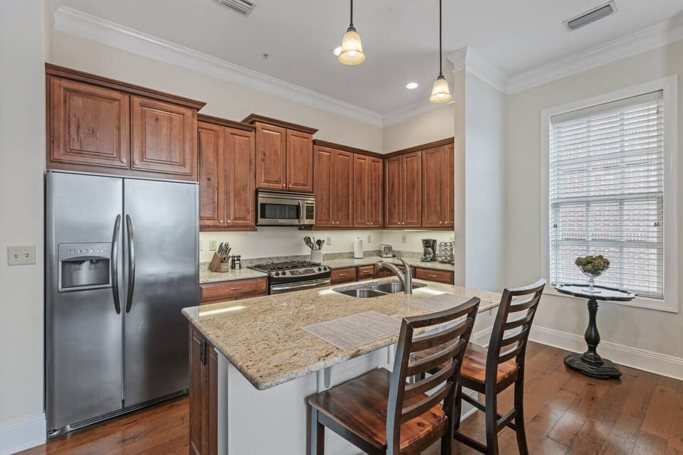 Open Kitchen with 2 counter stools.