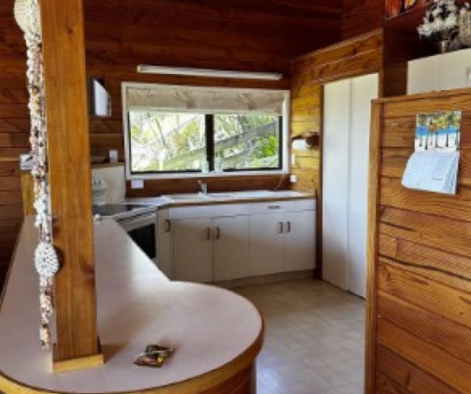 Kitchen - Dining table to left of the bench
