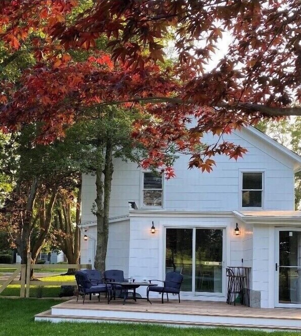 Deck overlooking rear yard and farmland 