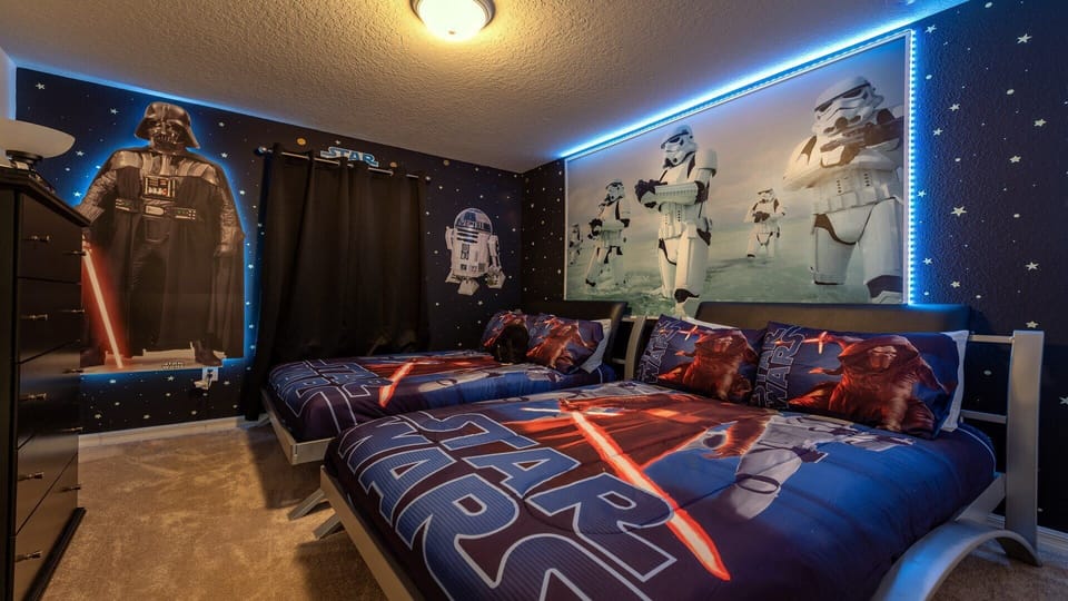 Bedroom: Comfortable arrangement with two full beds