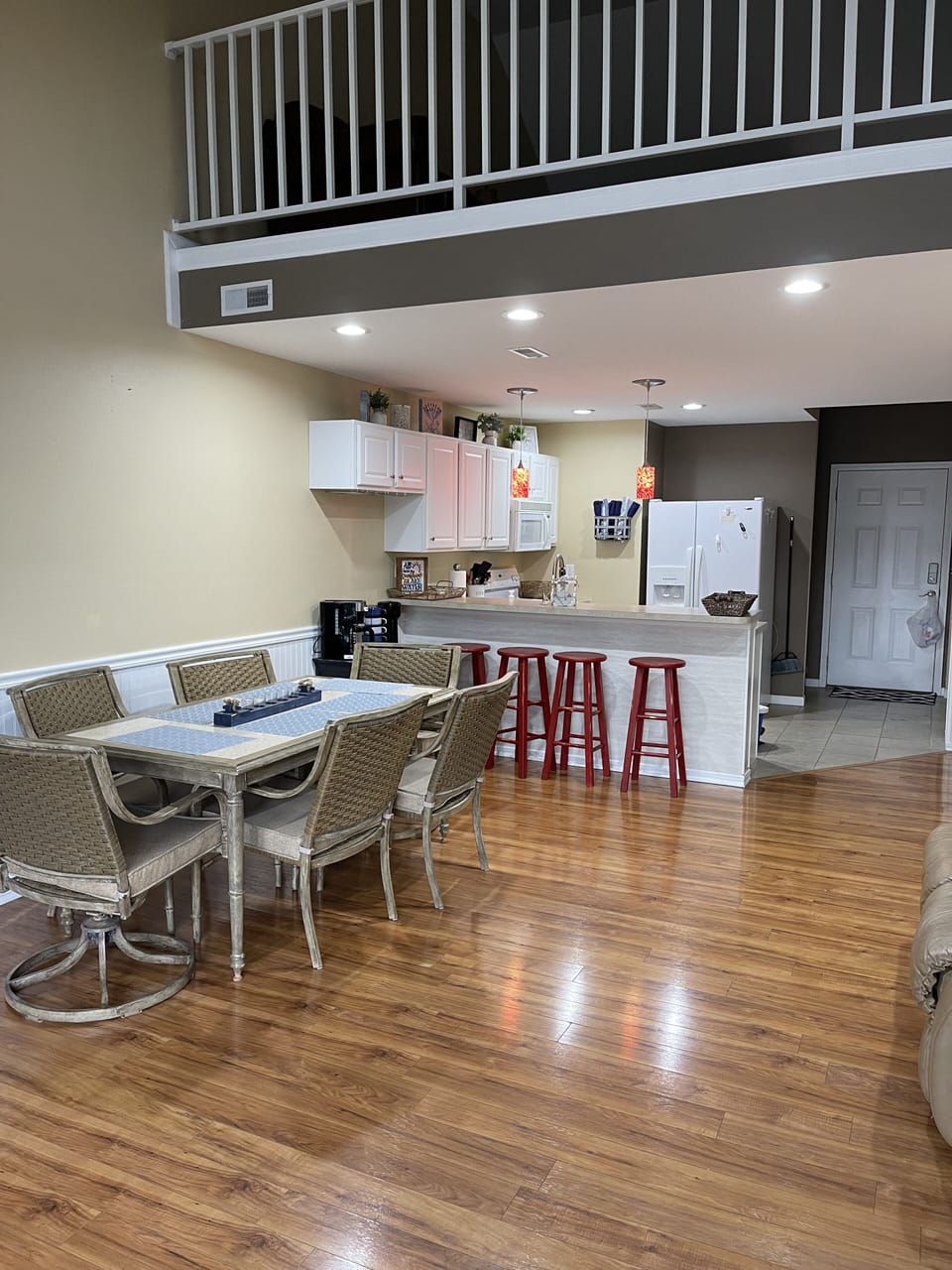 Kitchen table for 6 and 4 stools at breakfast bar.