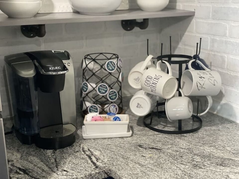 Keurig provided with starter pods for your coffee needs.  Home also has a coffee maker for those who need a pot of coffee.