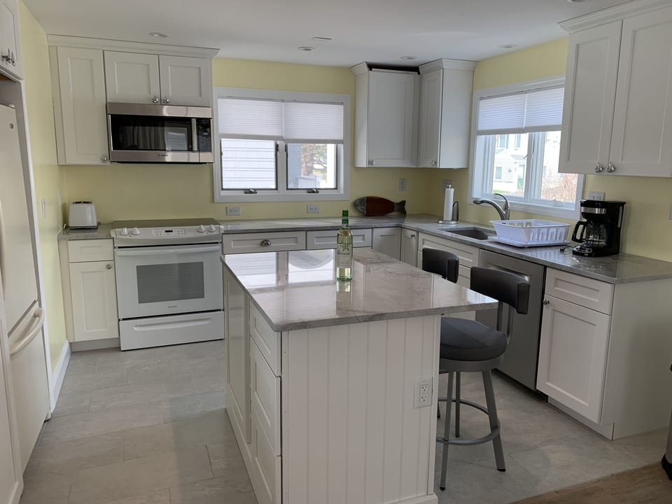newly renovated kitchen with granite countertops and Bosch appliances