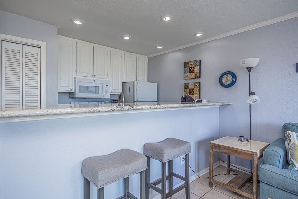 Kitchen bar area for dining or work space.