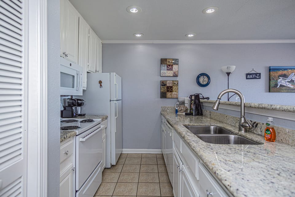 Updated kitchen with full size appliances. Everything needed for the home cook.