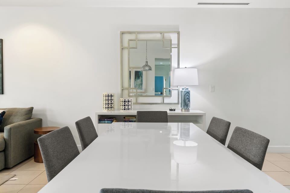 The condo features a dining table for 6 - perfect for sharing meals, handling some emails or having a games night!