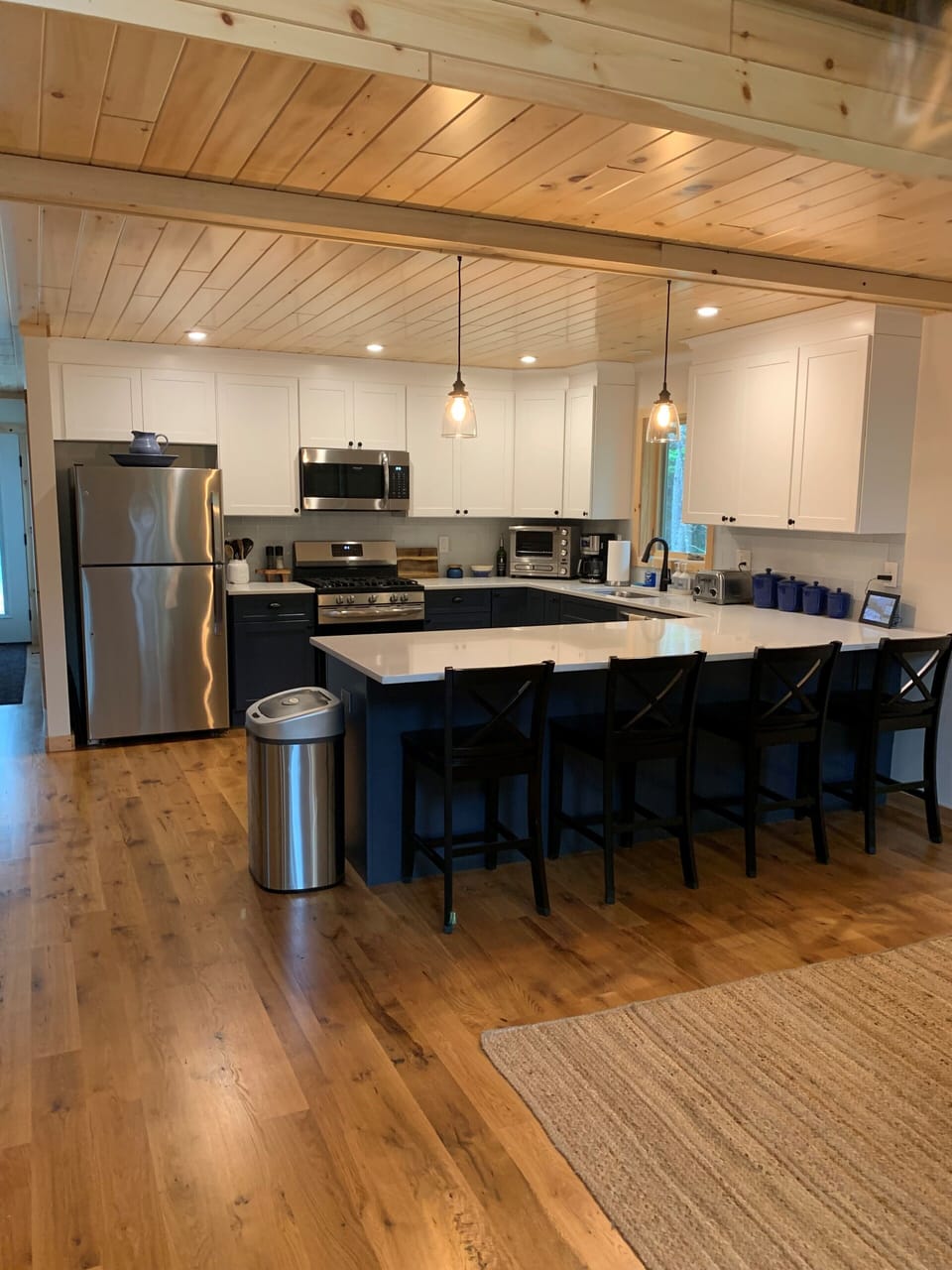 Fully equipped custom kitchen - with large peninsula.