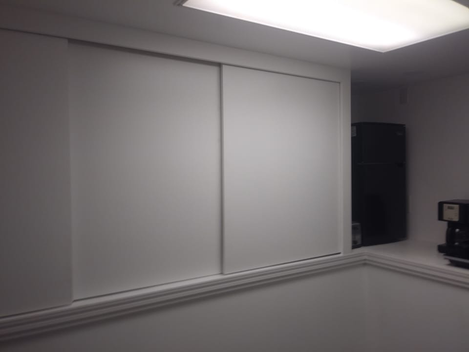 Pantry cabinets with dishes, utensils, cookware.