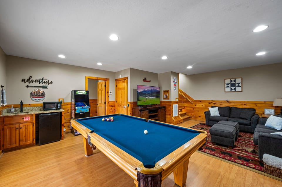 Newly added arcade with a variety of games. The third king bedroom is off of this space.